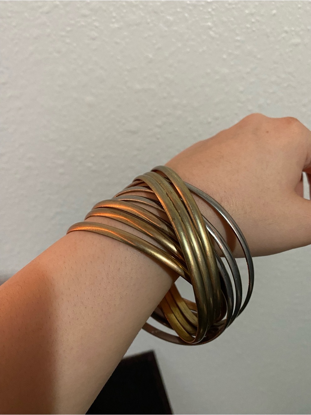 silver and gold tone interlinked bracelet bangle